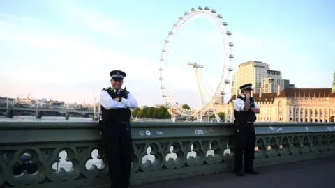 Getty Images Members of the Metropolitan Police patrol Westminster Bridge to stop a mass gathering on May 07, 2020 in London, England United Kingdom