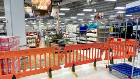 Getty Images The clothing section in Tesco cordoned off