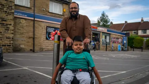 BBC/ Ed Lawrence Shazad and his son