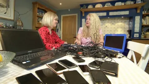 BBC News Louise and her family's hoard of old technology is typical of a UK household