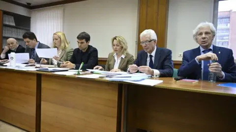 Getty Images The Moscow Helsinki Group's defence team in court