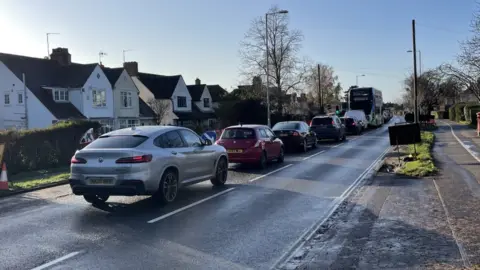 BBC Traffic queuing on a Cambridge road