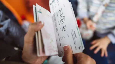 Getty Images passport and plane ticket