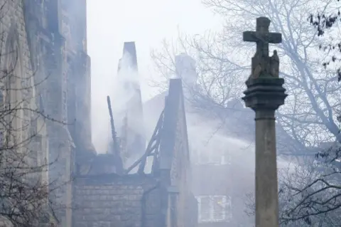 PA Media Damaged building of St Mark's church