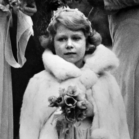 PA Media Princess Elizabeth arriving at the 16th Century Church at Balcombe, Sussex, for the wedding of Lady May Cambridge and Captain Henry Abel Smith