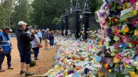 Jill Bennett/BBC Floral tributes to the Queen at Sandringham. Norfolk