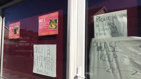 Signs outside Bedwas a fish and chip shop