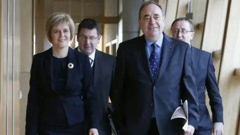 PA Media Nicola Sturgeon and Alex Salmond in Holyrood