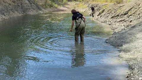 Environment Agency Workers at the River Redlake