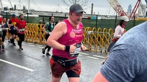 Frank running the marathon