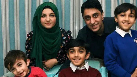 Yorkshire Post / SWNS Yusuf and his family