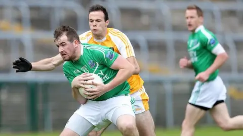 Press Eye Fermanagh's Sean Quigley in action against Ricky Johnston of Antrim