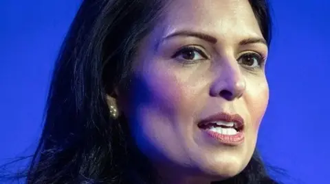 PA Media Priti Patel