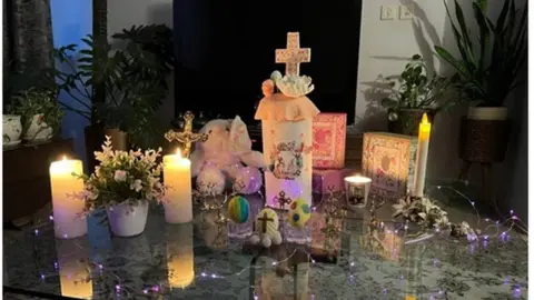 Tea lights and candles on table