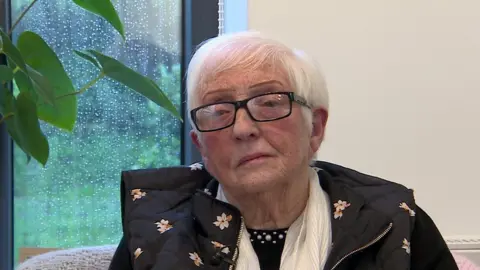 An 82-year-old widow with multiple health issues has praised community healthcare workers for keeping her alive and helping her to live in her own flat.