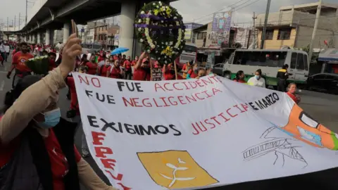 NurPhoto Members of the Francisco Villa Independent Popular Front march on Avenida Tláhuac to demand justice for the 26 people who died after a column collapsed on the night of May 3 between the Tezonco and Olivos subway stations of Line 12 of the Metro Collective Transport System in Mexico City.