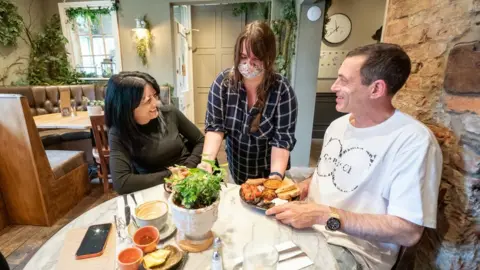 PA Media Kim Spencer and Anthony Winder at the Forest restaurant in York, as indoor hospitality and entertainment venues reopen to the public on 17 May 2021