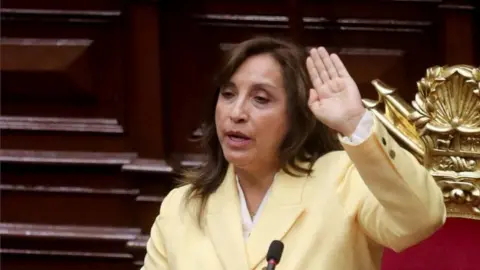 Reuters Dina Boluarte, who was called on by Congress to take the office of president after the legislature approved the removal of President Pedro Castillo in an impeachment trial, attends her swearing-in ceremony in Lima, Peru December 7, 2022.