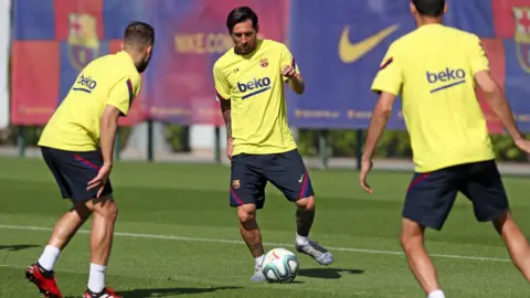 Getty Images Lionel Messi of FC Barcelona controls the ball during a training session