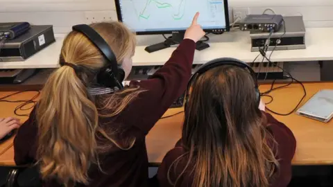 BBC School children using headphones