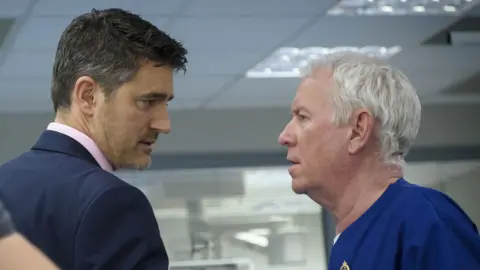 Tom Chambers with Derek Thompson in Casualty