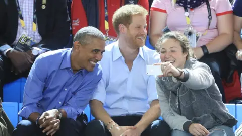 PA Barack Obama and Prince Harry
