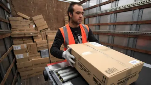 Getty Images An Amazon warehouse worker in Swansea.