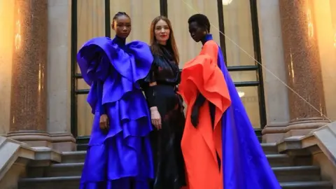 Chris Floyd Roksanda with two of her models at her spring 2020 London Fashion Week show