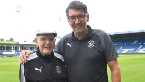 Luton Town FC/Twitter Fred Young and Mick Harford