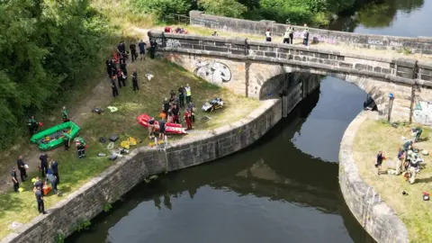 YappApp Emergency crews by the Aire and Calder Navigation in Wakefield