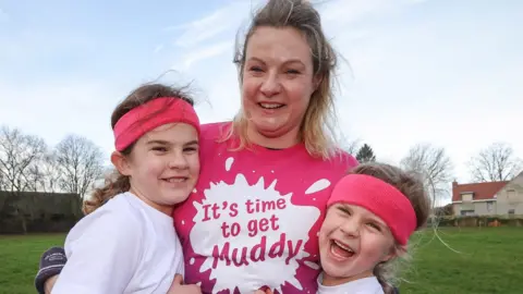 CRUK Emma and her two children, Naomi and Alana