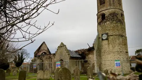 Martin Giles/BBC Burnt out St Mary's Church, Beachamwell, Norfolk