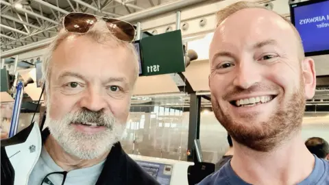 Aled Aled met Graham Norton in the airport in 2022