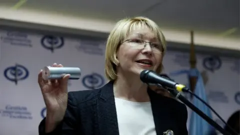 Reuters Venezuela's chief prosecutor Luisa Ortega Diaz displays a tear gas canister as she talks to the media during a news conference in Caracas, Venezuela May 24, 2017.