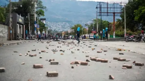 EPA Protesters block the streets leading to the house of the President of Haiti, Jovenel Moise, during a new day of protests in Port-au-Prince, Haiti, 24 February 2020