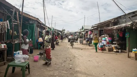 Getty Images A bustling street in the Kakuma camp