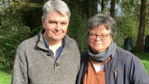 Huw's parents Karen and Jonathan