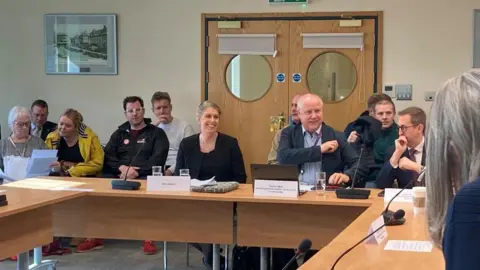 Nikki Watson alongside Stephen Mold