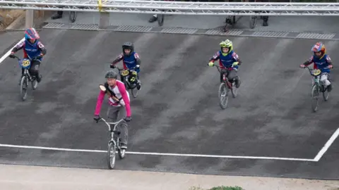 Getty Images Stephen Rooke takes part in the Birmingham 2022 Queen's Baton Relay as it visits Redditch BMX Club