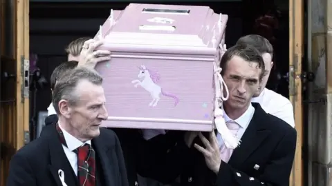 PA The coffin tbeing aken from the Coats Funeral Home, in Coatbridge, after the funeral