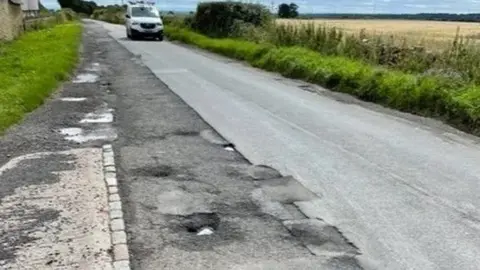 Lower part of Henson's Hill, Chedworth, with potholes