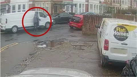 CCTV still showing El Gafari opening the van door