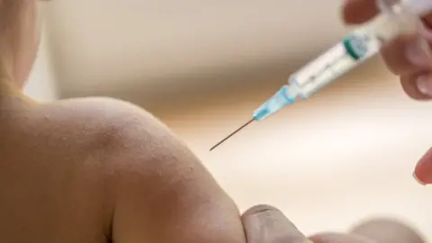 Getty Images Baby being injected