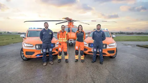 Magpas/Rob Holding   Magpas team with rapid response vehicles and air ambulance.