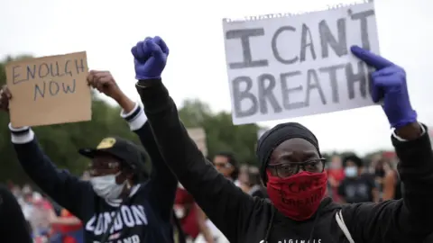 Getty Images Protesters in London's Hyde Park