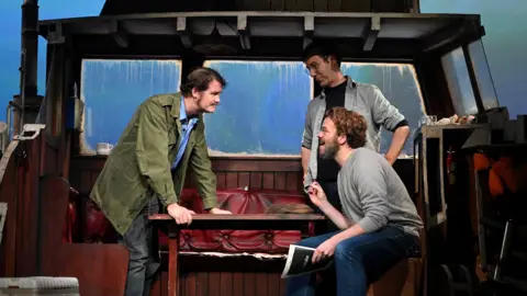 Getty Images The Shark Is Broken cast on stage at the Ambassadors Theatre in London in October 2021