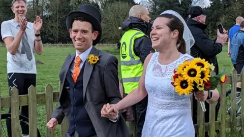 BBC Simon Wright and Anna Thorpe in wedding outfits