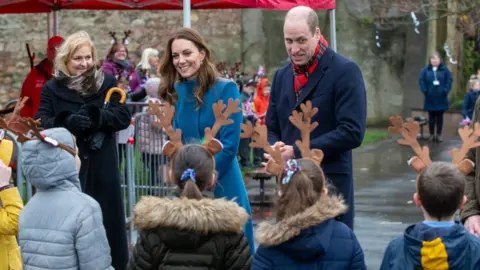 Reuters Kate and William were greeted by children wearing antlers on their heads at a school visit in Berwick-upon-Tweed