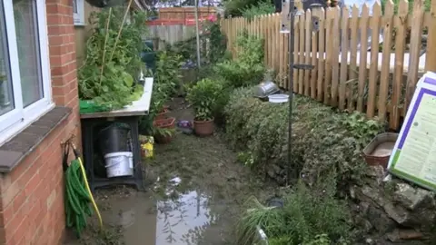 Garden flooded by sewage