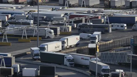 Getty Images Lorries arrive and depart from Dover Ferry Terminal